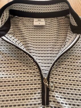 Daily Sports Women's Black and White Zip Tank Top